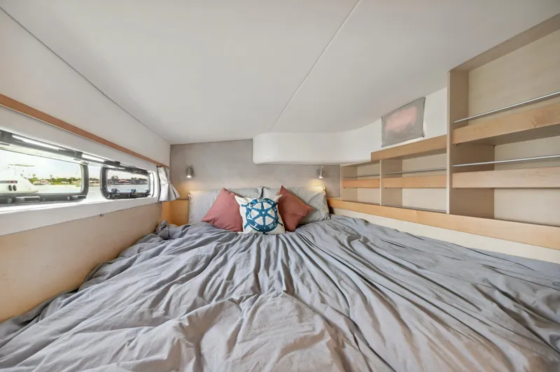 Slide: The Image of Cozy bedroom interior of 2016 Catana 42 yacht with nautical-themed decor. - 34