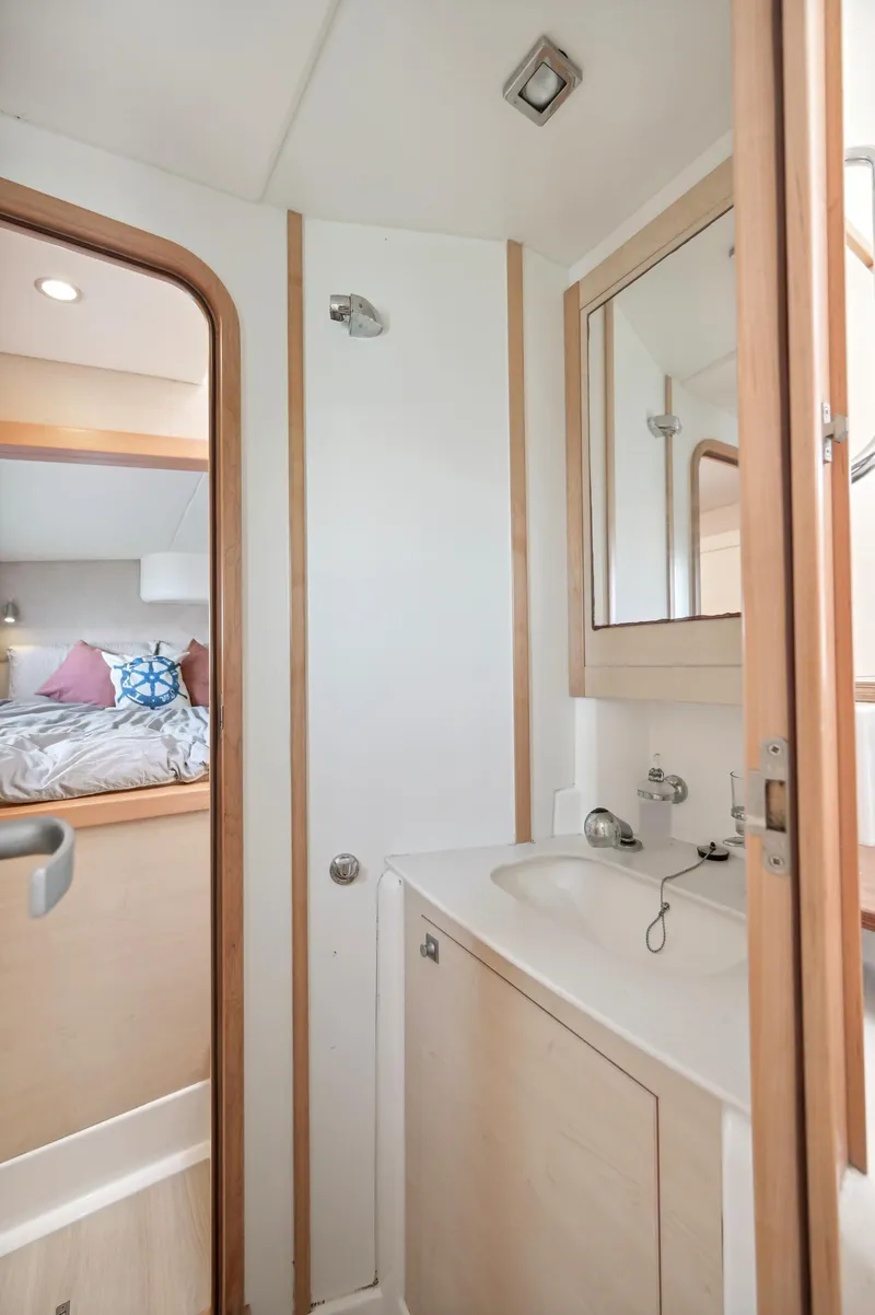 Slide: The Image of 2016 Catana 42 yacht interior bathroom with sink and mirror. - 37