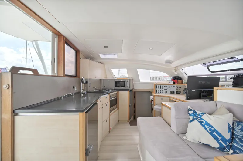 Slide: The Image of Modern interior of 2016 Catana 42 catamaran with kitchen and seating area. - 39