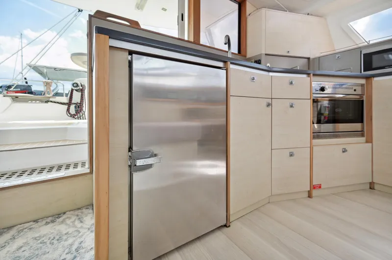 Slide: The Image of Modern kitchen interior of 2016 Catana 42 yacht with stainless steel appliances. - 41