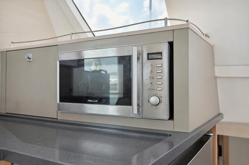 Slide: The Image of Built-in microwave on Catana 42 yacht, 2016 model, with sleek modern design. - 45