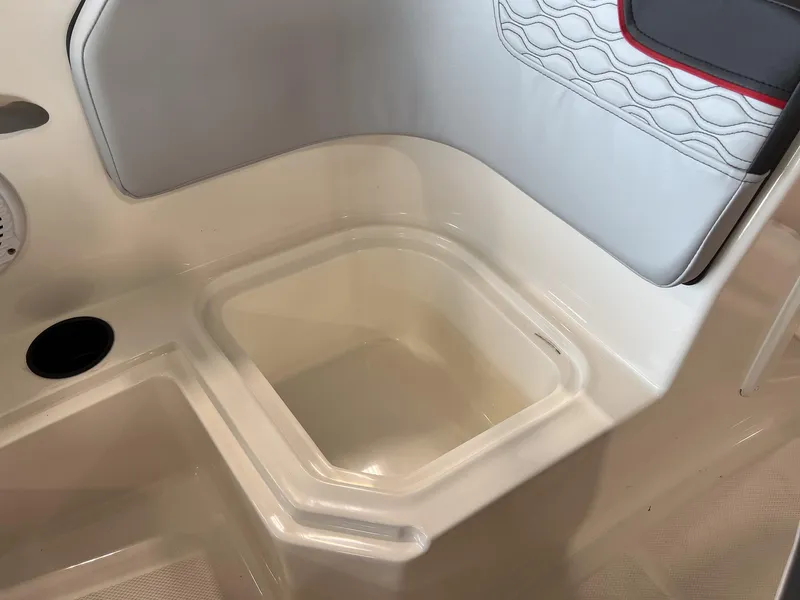 Slide: The Image of 2023 Bayliner Element M15 boat interior storage compartment and seating area. - 10