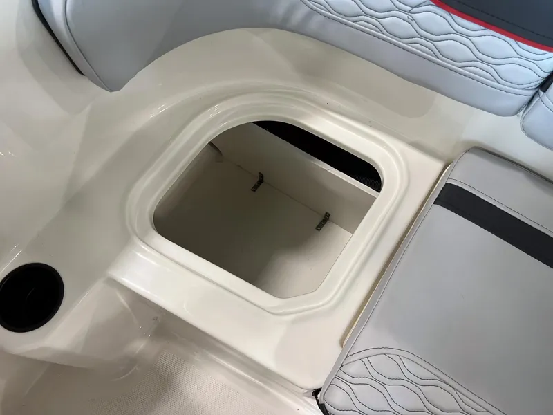 Slide: The Image of 2023 Bayliner Element M15 boat storage compartment and seating detail. - 17