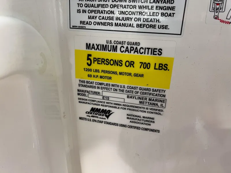 Slide: The Image of 2023 Bayliner Element M15 capacity label, 5 persons or 700 lbs, 60 HP motor. - 21