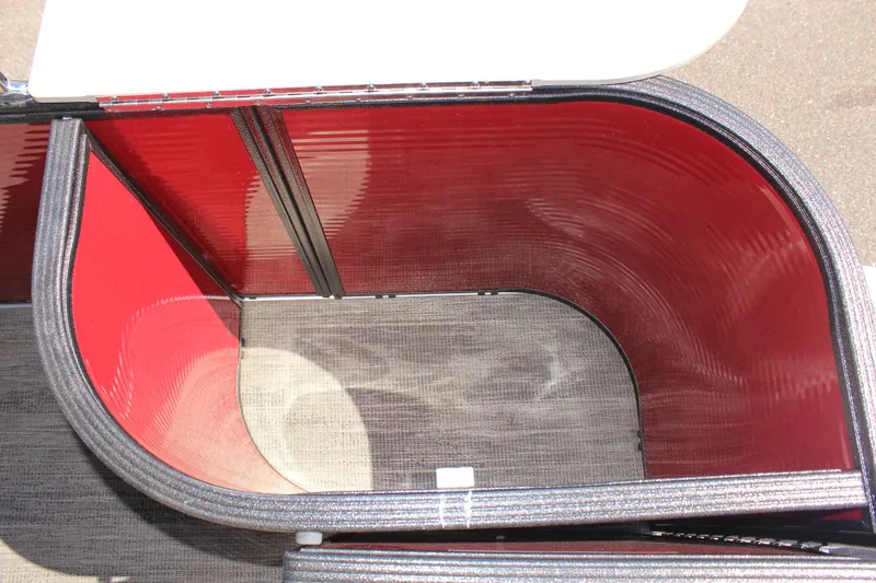 Slide: The Image of 2023 Crest Classic 200 LX L boat interior with red and black seating. - 13