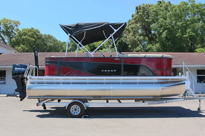 Slide: The Image of 2023 Crest Classic 200 LX L pontoon boat with Suzuki outboard motor. - 4