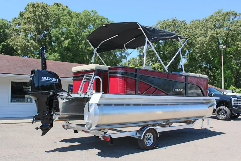 Slide: The Image of 2023 Crest Classic 200 LX L pontoon boat with Suzuki outboard motor. - 5