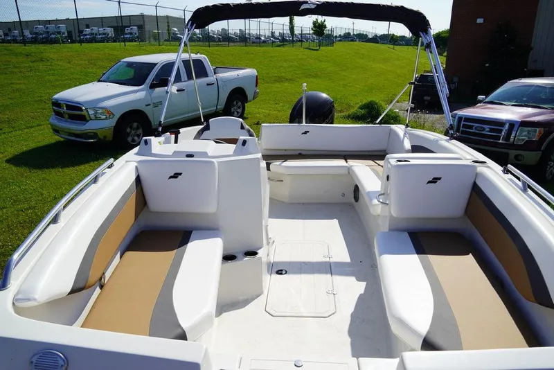 Slide: The Image of 2023 Starcraft SVX OB 171 OB boat interior with seating and canopy. - 3