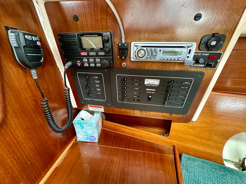 Slide: The Image of Control panel of a 2000 Beneteau Oceanis 321 sailboat with radio and navigation equipment. - 15