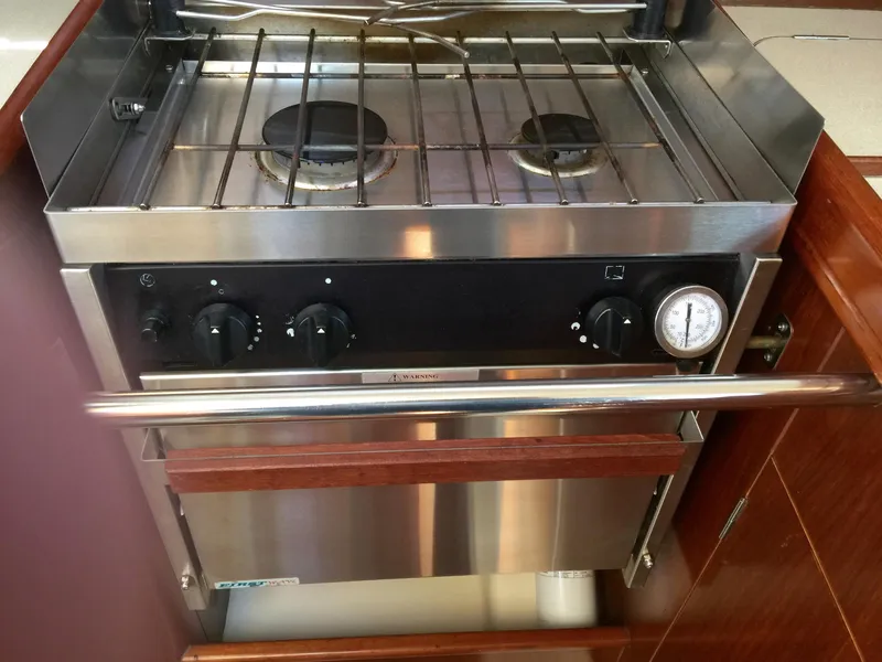 Slide: The Image of Stainless steel stove and oven in 2000 Beneteau Oceanis 321 yacht kitchen. - 30