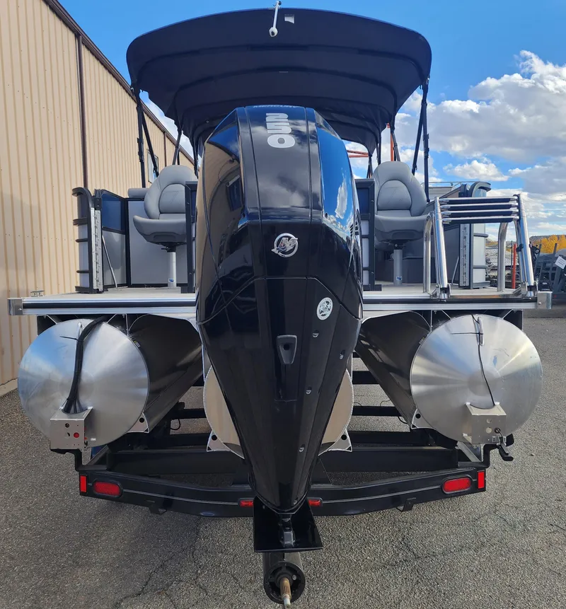 Slide: The Image of 2023 South Bay S224FCR pontoon boat with outboard motor, rear view. - 4