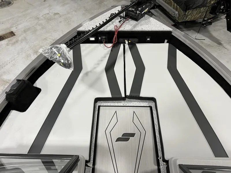 Slide: The Image of 2023 Starcraft Patriot 16 TL boat interior with modern design and sleek detailing. - 7