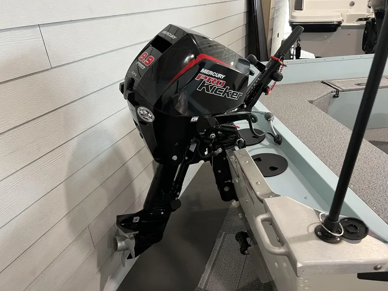 Slide: The Image of 2023 Starcraft Patriot 16 TL boat with Mercury Pro Kicker 9.9 HP outboard motor. - 9