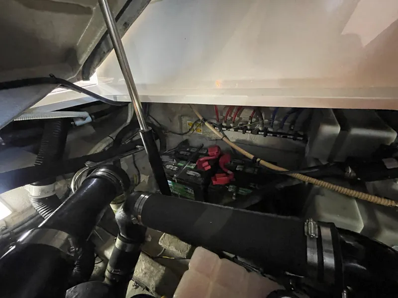 Slide: The Image of Engine compartment of a 2007 Sea Ray 38 Sundancer boat showing batteries and wiring. - 28