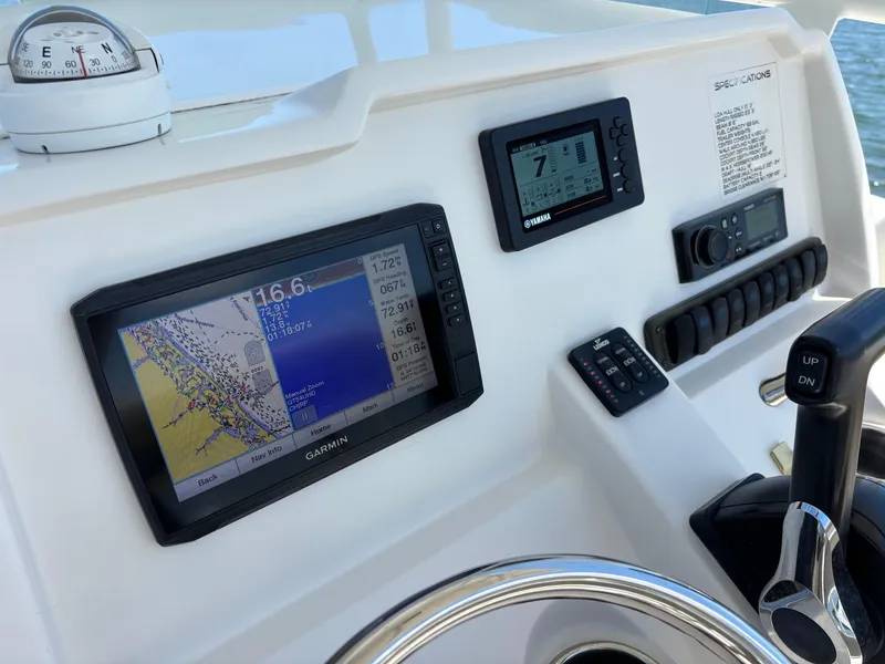 Slide: The Image of Dashboard of 2020 Sailfish 220 CC boat with Garmin navigation system. - 21