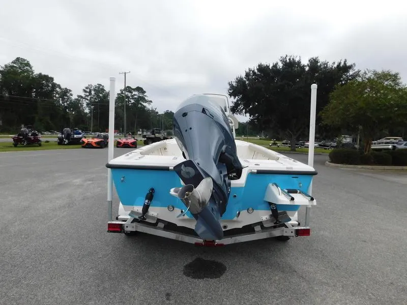 Slide: The Image of 2023 Key West 210BR boat rear view with outboard motor. - 4