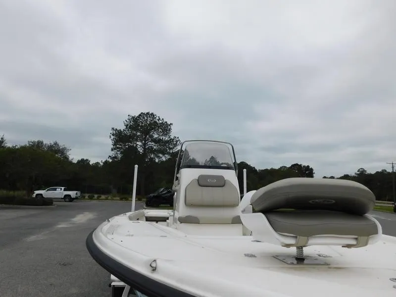 Slide: The Image of 2023 Key West 210BR boat parked on a cloudy day. - 5