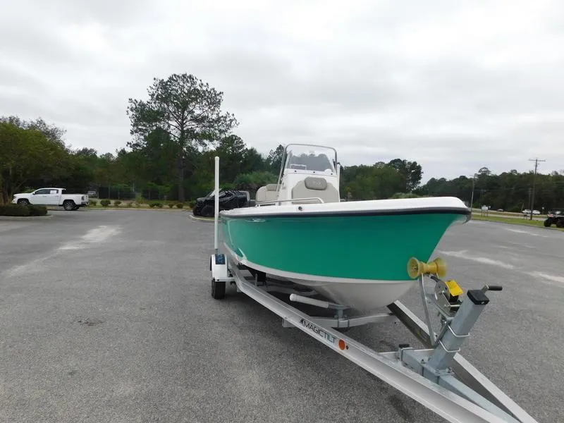 Slide: The Image of 2023 Key West 1720CC boat on trailer in parking lot. - 2
