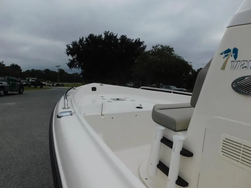 Slide: The Image of 2023 Key West 1720CC boat, side view of deck and seating area. - 6