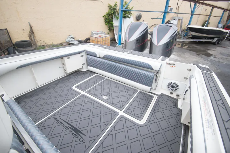 Slide: The Image of 2006 Hydra-Sports Vector 3300 VX boat deck with dual outboard motors. - 24