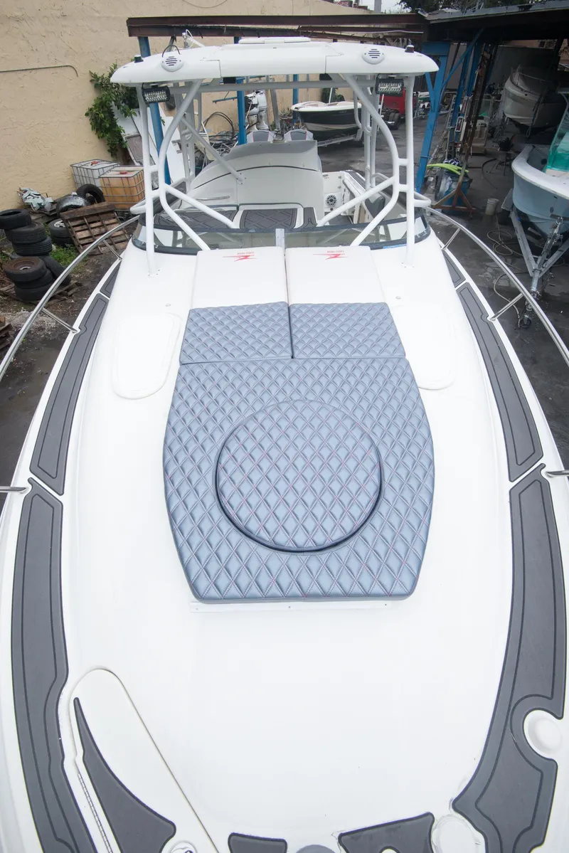 Slide: The Image of 2006 Hydra-Sports Vector 3300 VX boat deck with cushioned seating. - 26