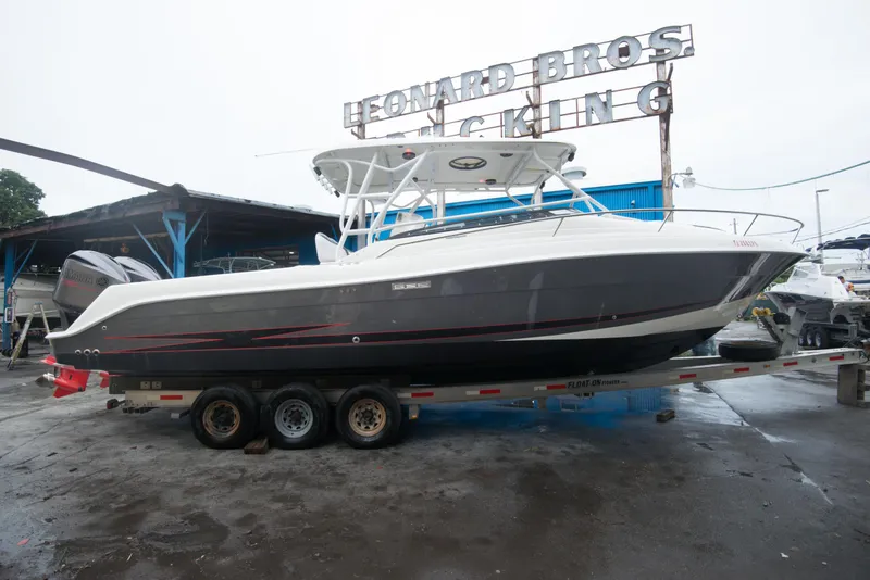 Slide: The Image of 2006 Hydra-Sports Vector 3300 VX boat on a trailer at Leonard Bros. Docking. - 5