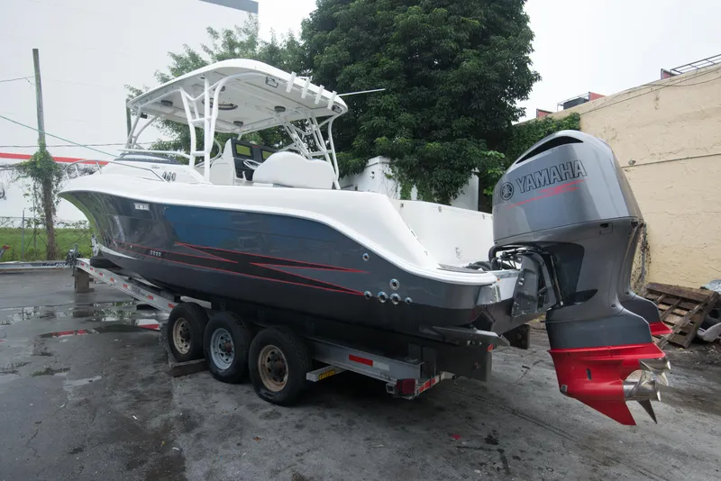 Slide: The Image of 2006 Hydra-Sports Vector 3300 VX boat on a trailer with Yamaha outboard motor. - 9