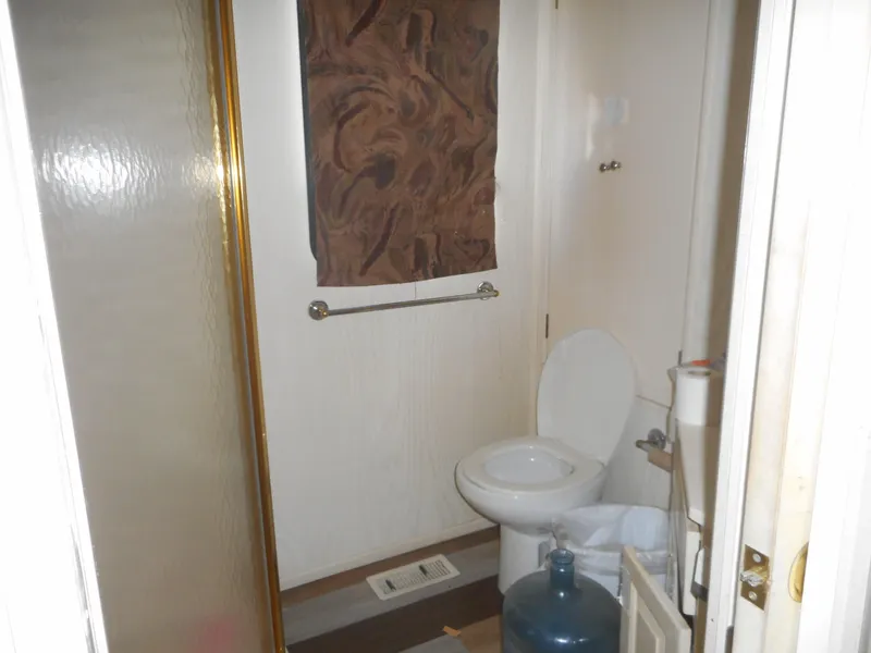 Slide: The Image of Bathroom interior of 2000 Stardust Cruisers Pure Enchantment Share #27 houseboat. - 16
