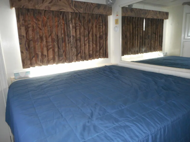 Slide: The Image of Cozy bedroom with blue bedding in 2000 Stardust Cruisers Pure Enchantment Share #27. - 21