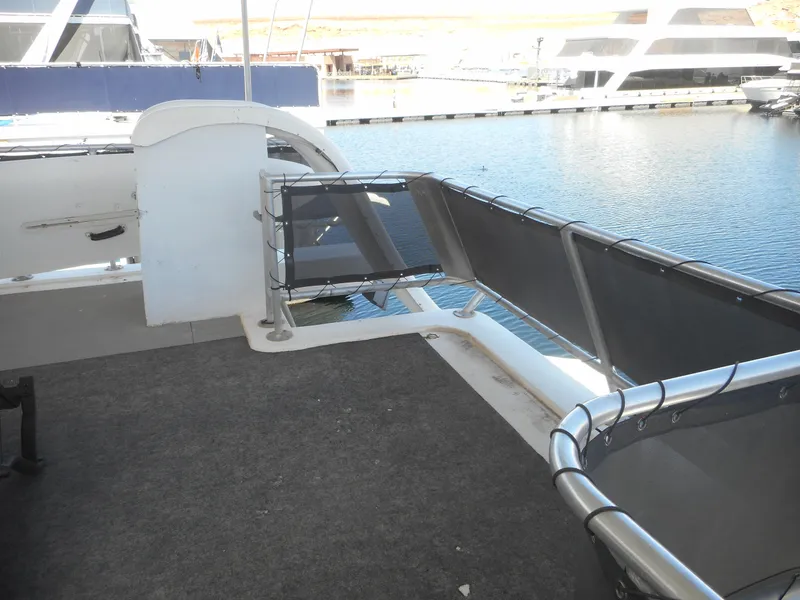 Slide: The Image of Houseboat deck view, Stardust Cruisers Pure Enchantment Share #27, 2000 model, docked at marina. - 27