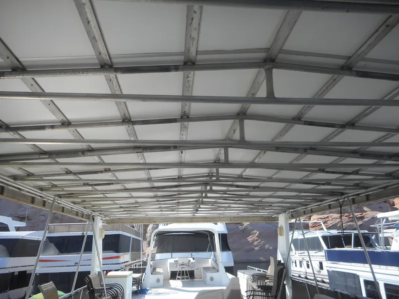 Slide: The Image of Rooftop view of 2000 Stardust Cruisers Pure Enchantment Share #27 houseboat at marina. - 31