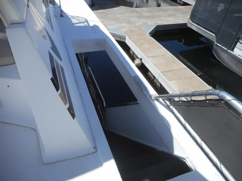 Slide: The Image of Stardust Cruisers 2000 Pure Enchantment Share #27 yacht deck with stairs and railing. - 37