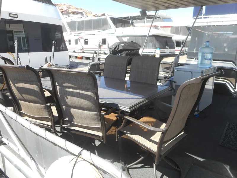 Slide: The Image of Outdoor dining area on 2000 Stardust Cruisers Pure Enchantment Share #27 houseboat. - 4