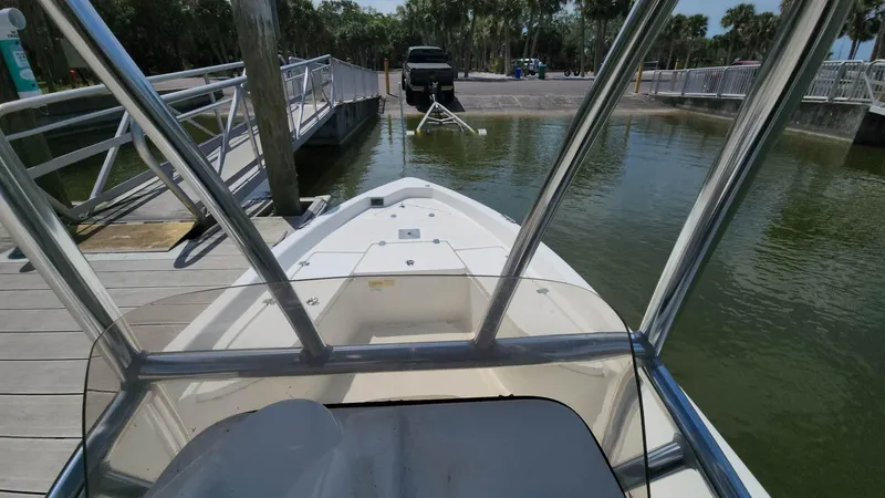 Slide: The Image of 2020 NauticStar 2140 Sport boat at dock, ready for launch. - 11