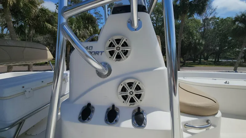 Slide: The Image of 2020 NauticStar 2140 Sport boat console with speakers and controls. - 22
