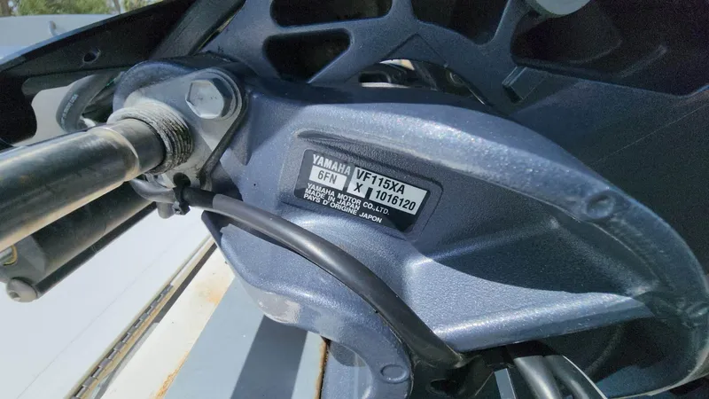 Slide: The Image of Close-up of Yamaha VF115XA engine on 2020 NauticStar 2140 Sport boat. - 36