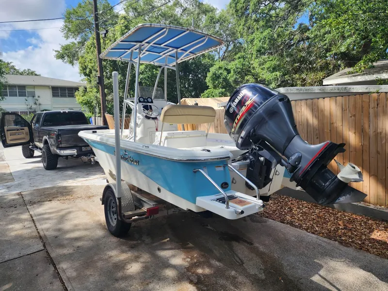 Slide: The Image of 2020 NauticStar 2140 Sport boat with Yamaha outboard motor on trailer. - 46