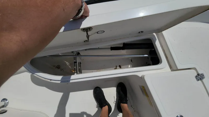 Slide: The Image of 2020 NauticStar 2140 Sport boat storage compartment. - 5