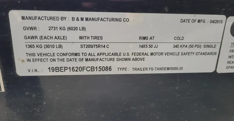Slide: The Image of Label displaying vehicle specifications and compliance details for a 2011 Bennington 2575 RCW 3 I/O. - 21