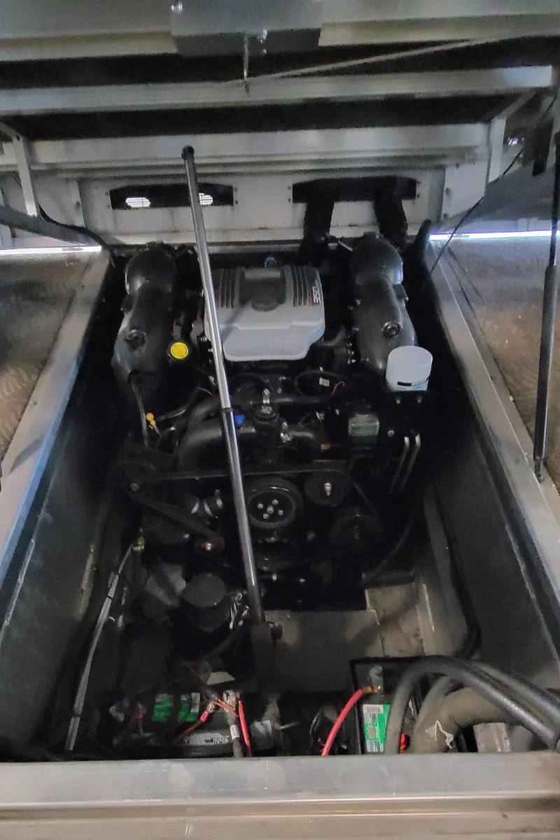 Slide: The Image of Engine compartment of a 2011 Bennington 2575 RCW 3 I/O boat. - 23
