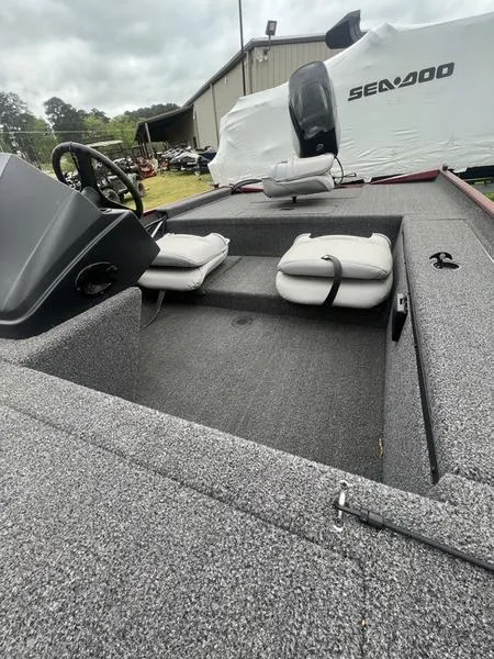 Slide: The Image of 2023 Crestliner 1600 Storm fishing boat interior with cushioned seats. - 3