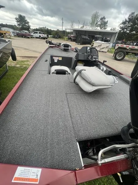 Slide: The Image of 2023 Crestliner 1600 Storm fishing boat with gray deck and seating. - 6