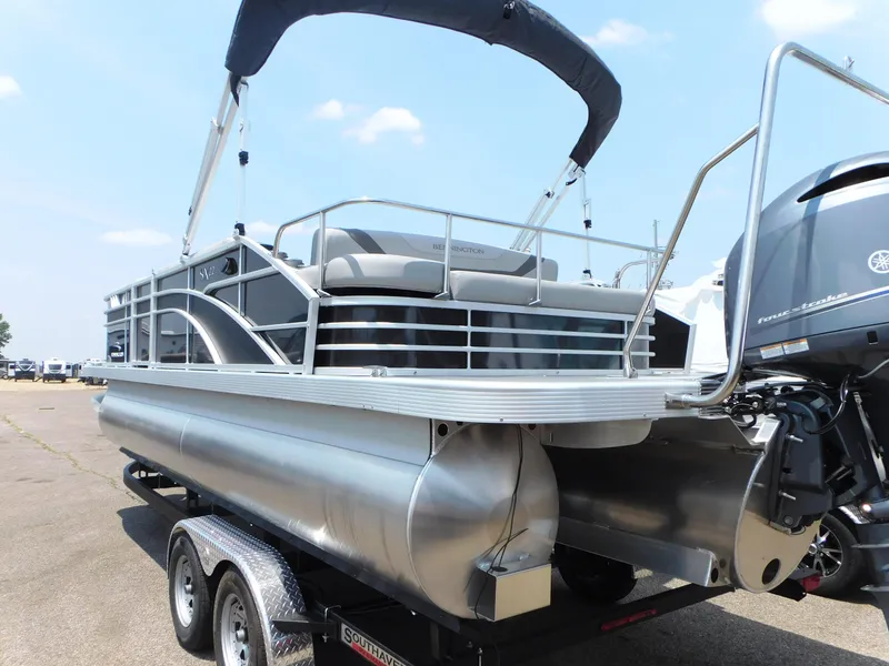 Slide: The Image of 2023 Bennington 22 SXSB pontoon boat on a trailer, rear view. - 5