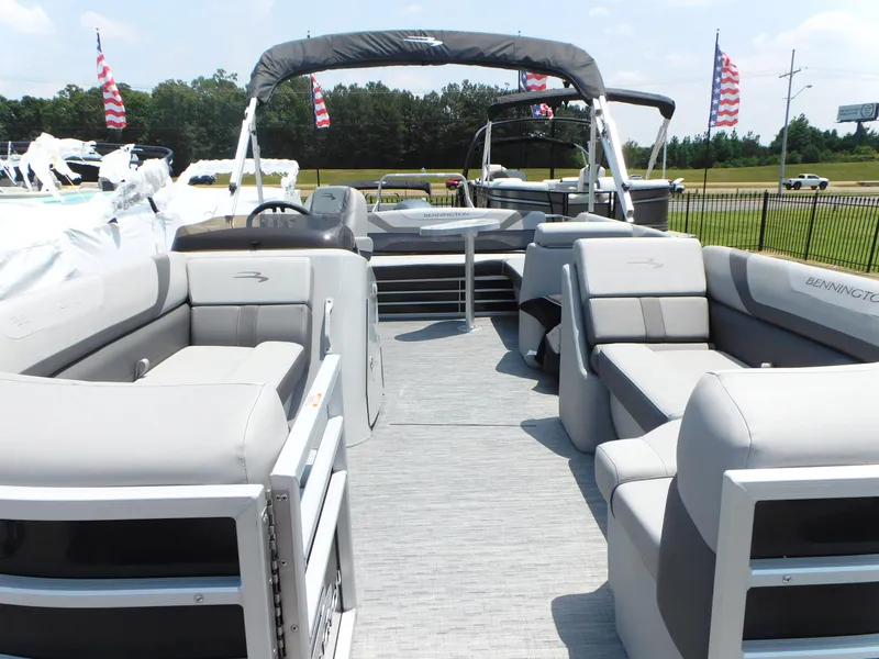 Slide: The Image of 2023 Bennington 22 SXSB pontoon boat with spacious seating and modern design. - 6
