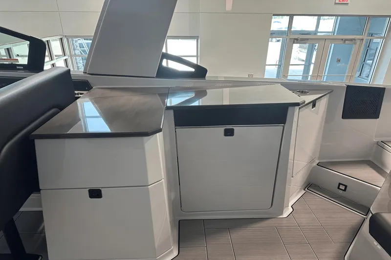 Slide: The Image of 2023 Aviara AV32 interior showcasing sleek cabinetry and modern design elements. - 13