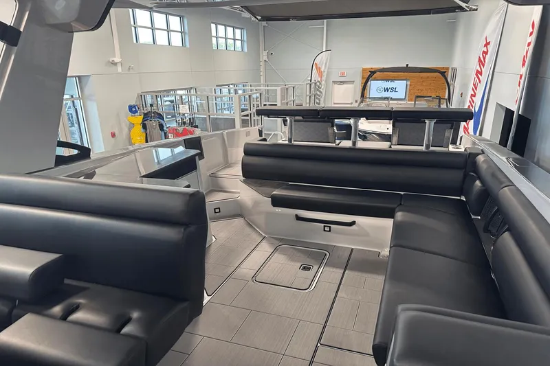 Slide: The Image of 2023 Aviara AV32 boat interior with sleek black seating and modern design. - 15