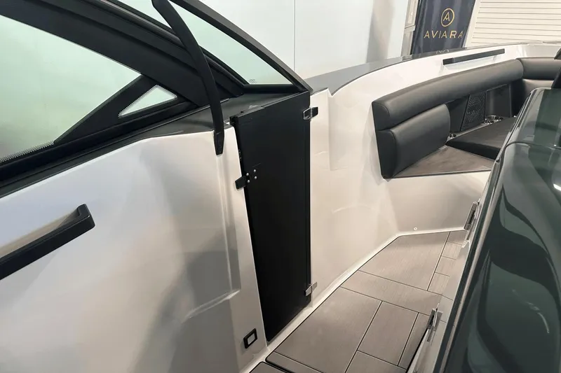 Slide: The Image of 2023 Aviara AV32 boat interior with sleek seating and modern design. - 25