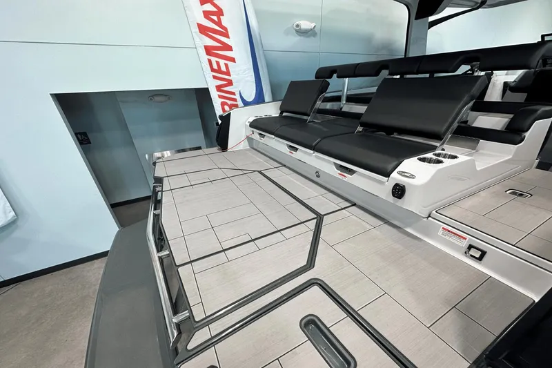Slide: The Image of 2023 Aviara AV32 boat interior with sleek seating and modern design. - 4