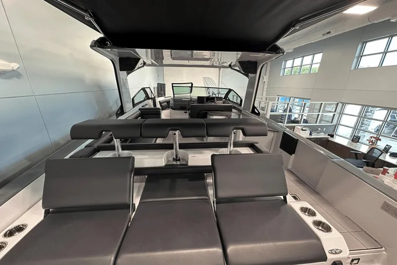 Slide: The Image of 2023 Aviara AV32 luxury boat interior with sleek seating and modern design. - 6
