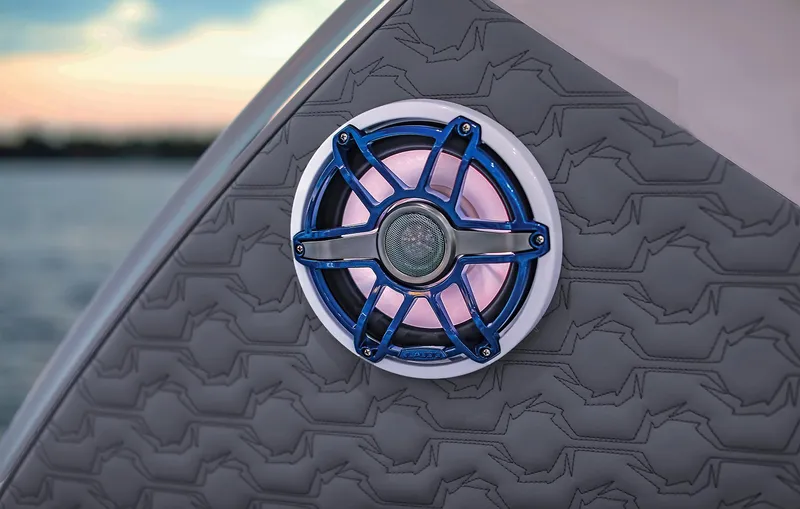 Slide: The Image of Close-up of a 2025 Fountain 39 DX boat speaker with blue LED lighting. - 11